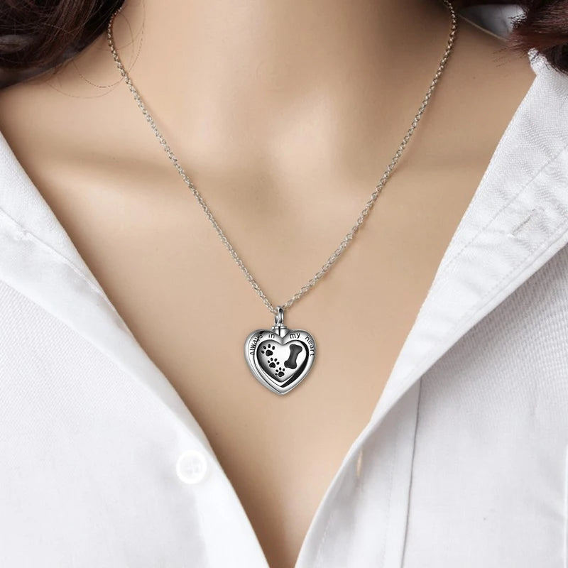 Heart urn and dog paw necklace
