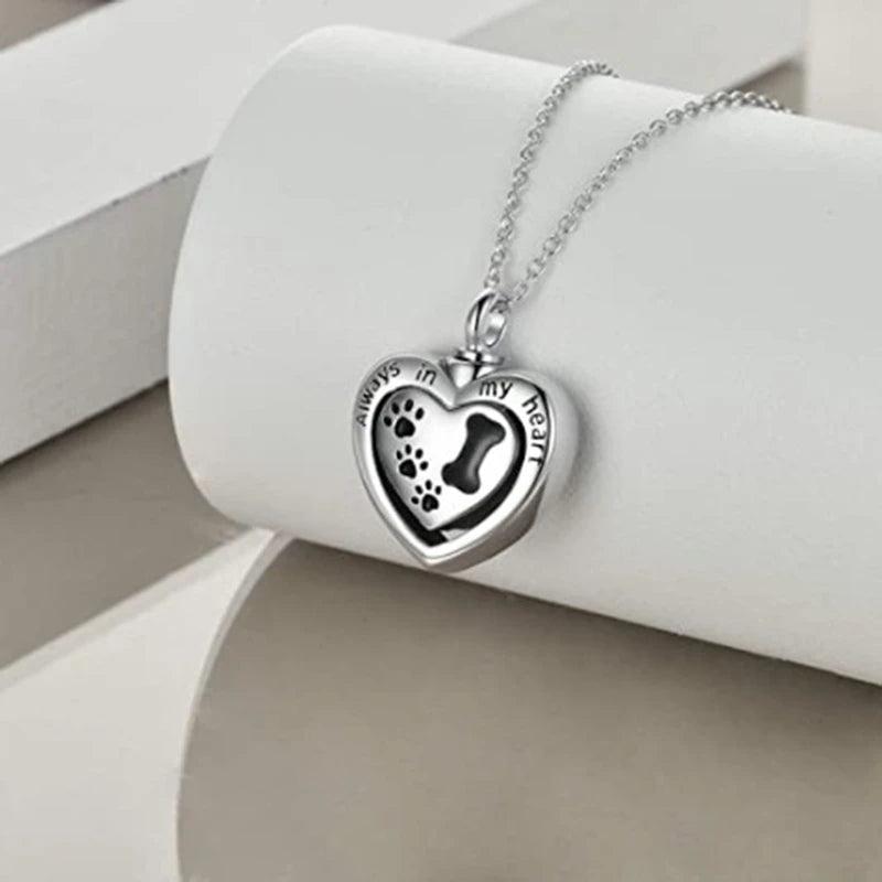Heart urn and dog paw necklace