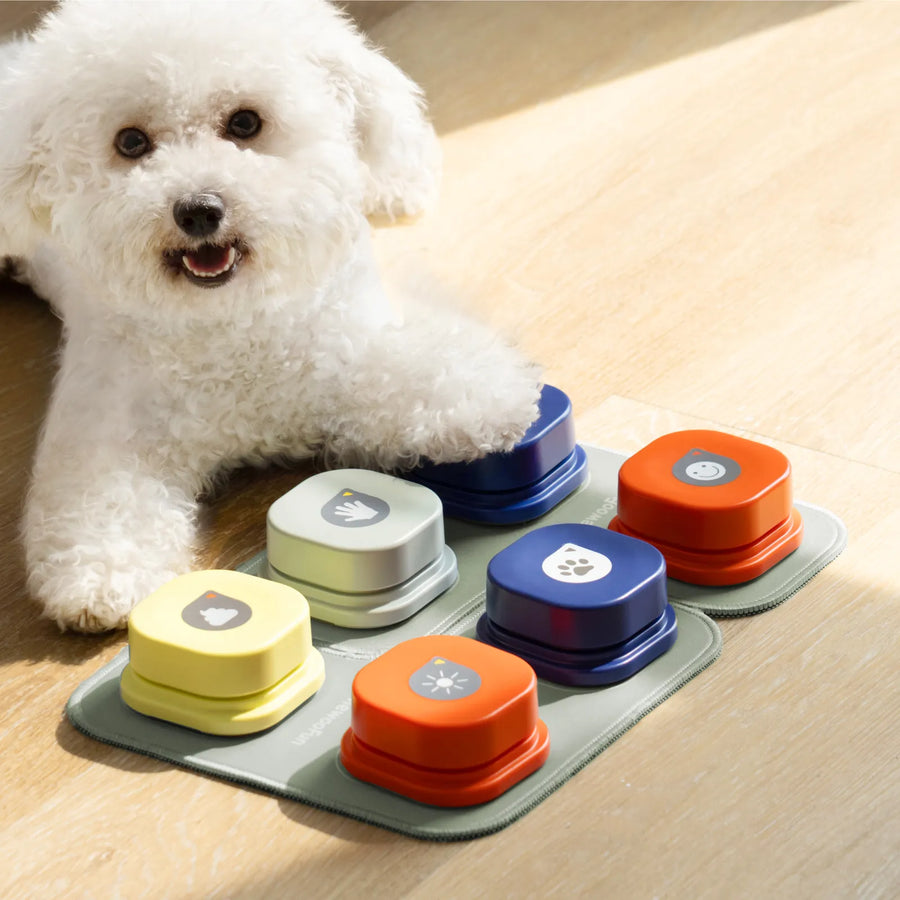 Velcro attachments ensure the button stays in place on the dog talking button mat.