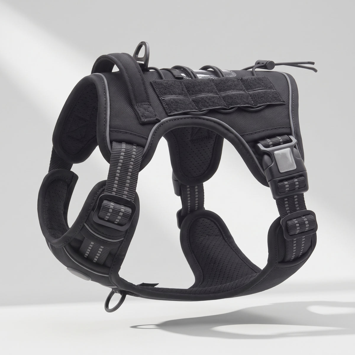 Adjustable Tactical Dog Harness, studio photo on a light grey background