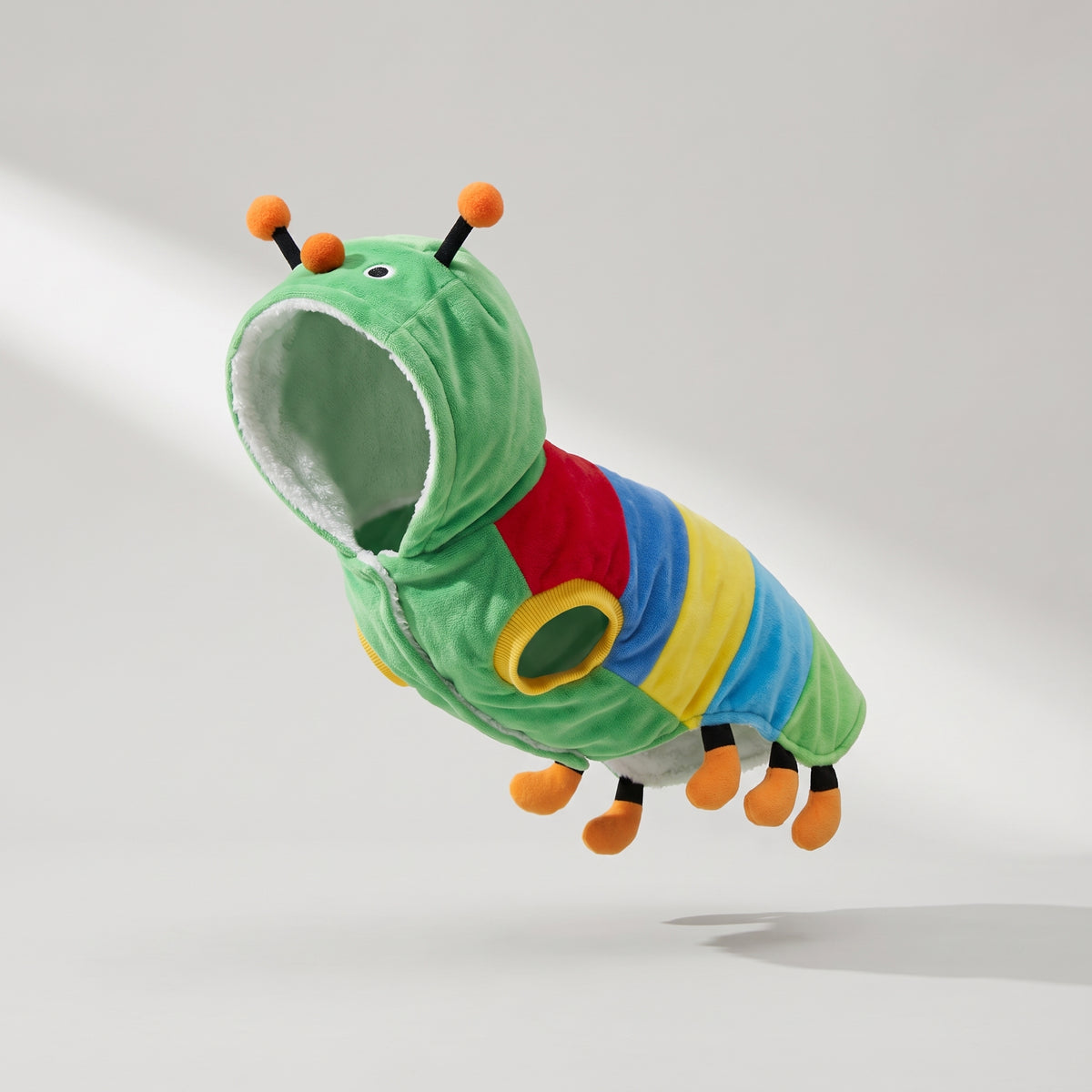 Caterpillar Dog Costume, studio photo on a light grey background