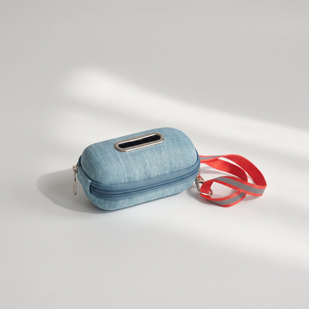 PVC Dispenser for Dog Poop Bags, studio photo on a light grey background