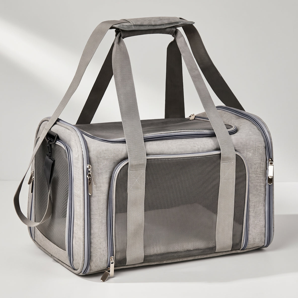 Dog Bag Carrier, studio photo on a light grey background