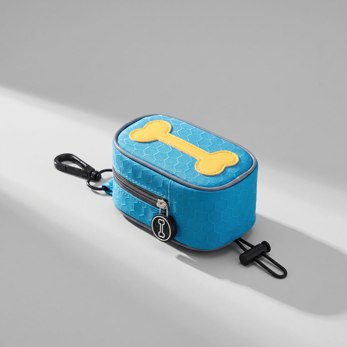 Dog Bag Dispenser, studio photo on a light grey background