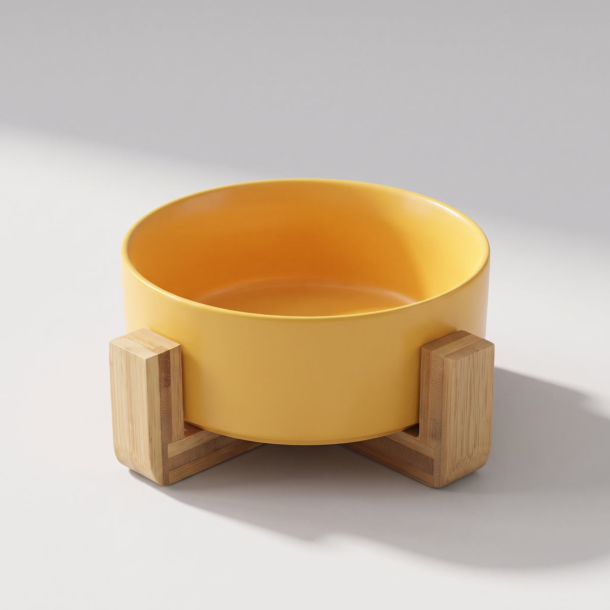 Dog Food Bowl With Stand, studio photo on a light grey background