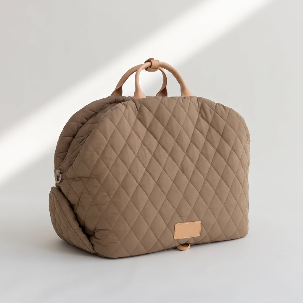 Dog Handbag Carrier, studio photo on a light grey background