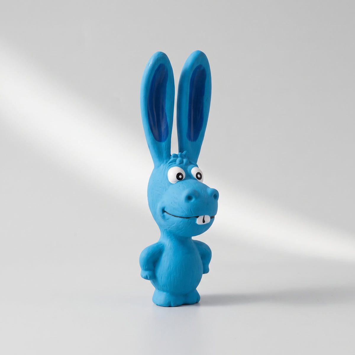 Dog Latex Chew Toy, studio photo on a light grey background
