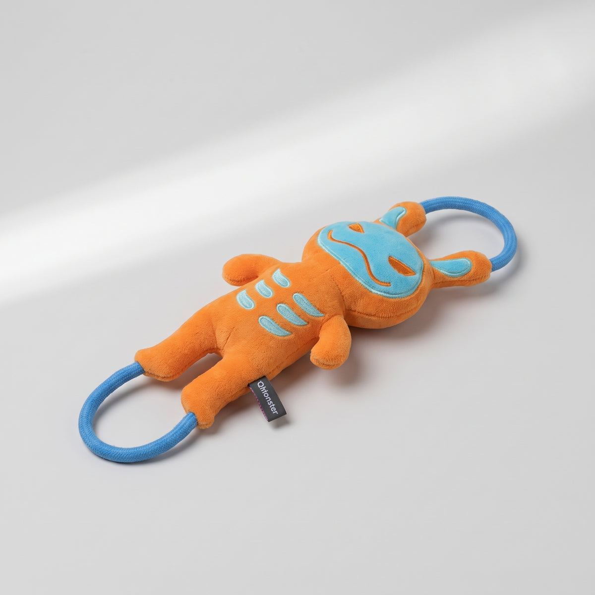 Dog Pull Toy, studio photo on a light grey background
