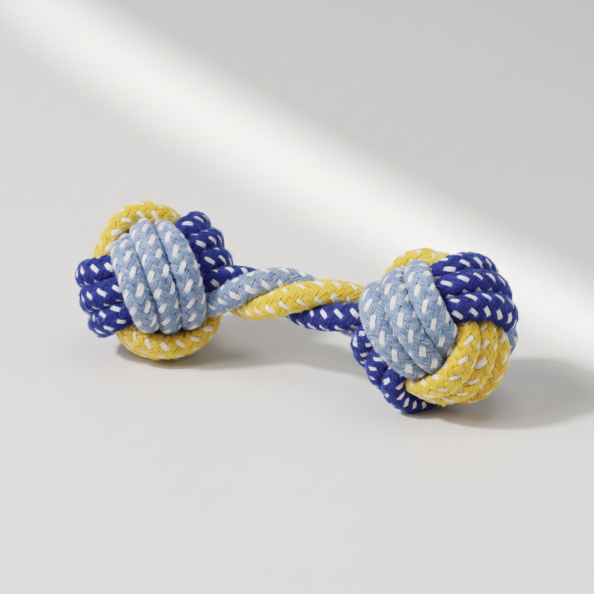 Dog Rope Toys, studio photo on a light grey background