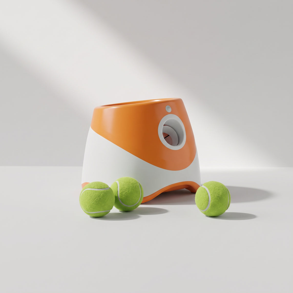 Dog Tennis Ball Launcher, studio photo on a light grey background