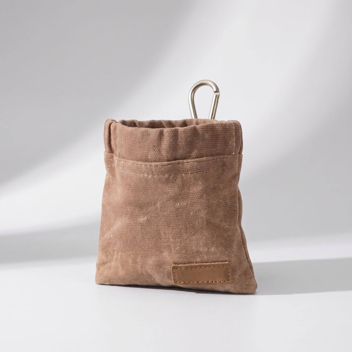 Dog Treat Bag for Training Walks, studio photo on a light grey background