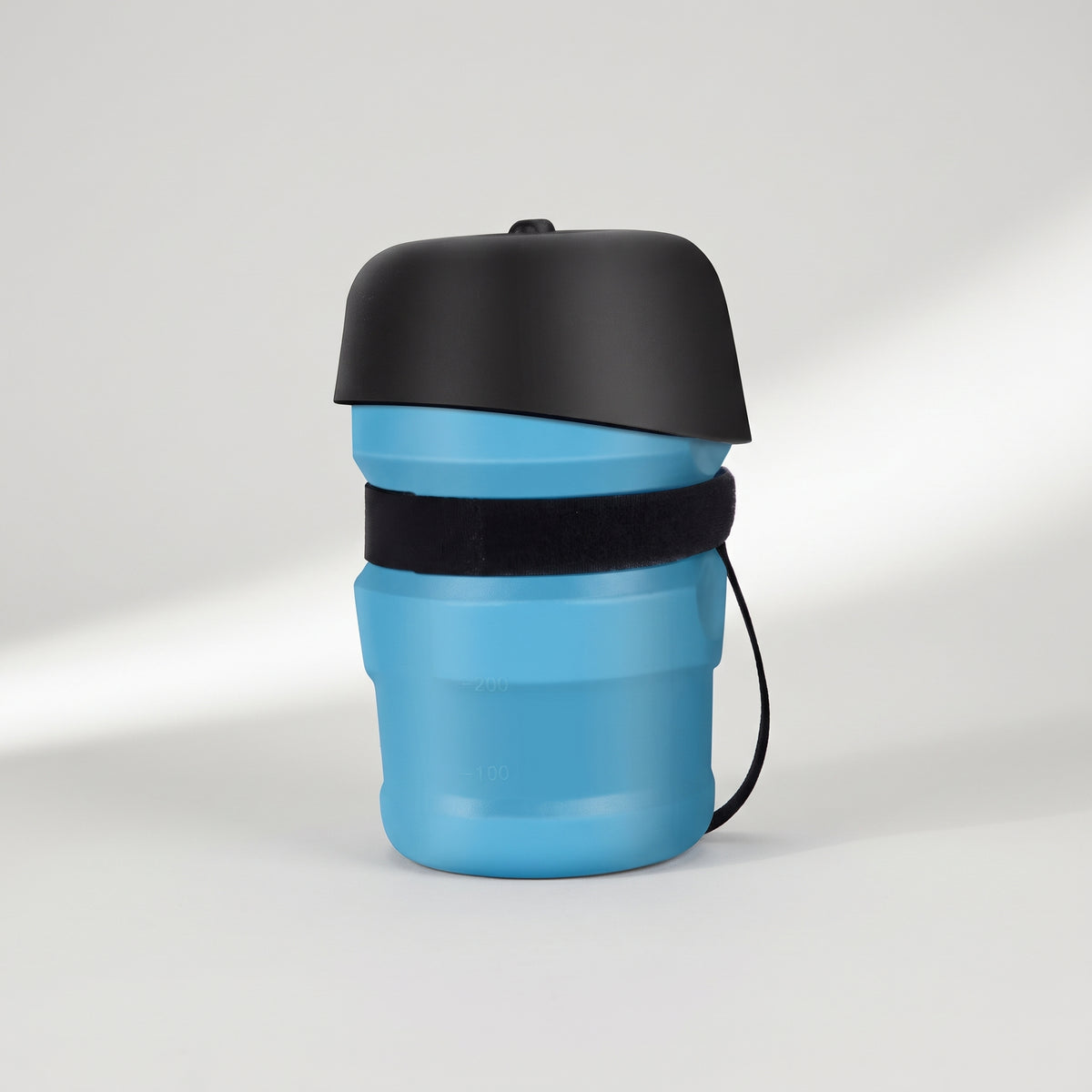 Foldable Dog Water Bottle, studio photo on a light grey background