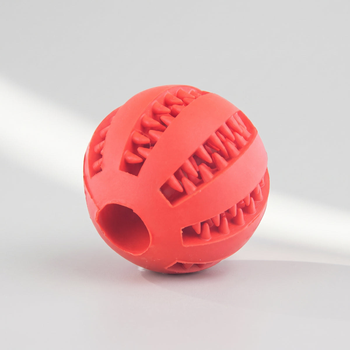 Dental Chew Ball for Aggressive Chewers, studio photo on a light grey background