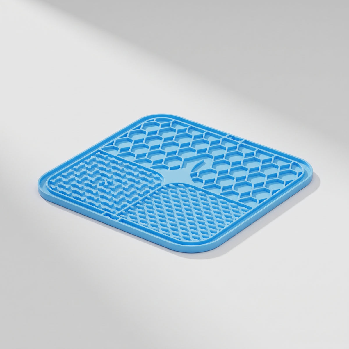 Silicone Lick Pad for Dogs with Spoon Option, studio photo on a light grey background