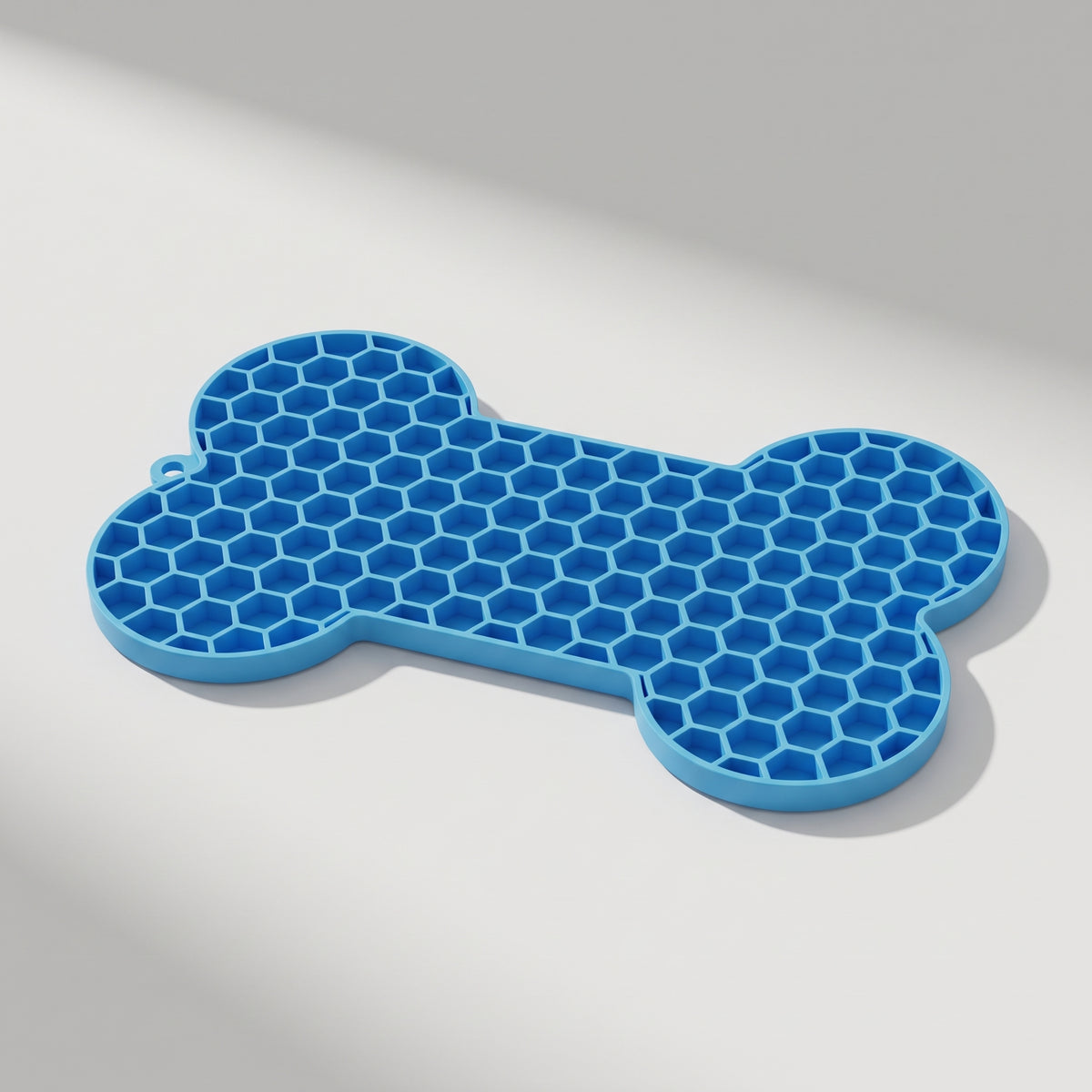 Silicone Lick Mat for Dogs, Mealtime Enrichment, studio photo on a light grey background