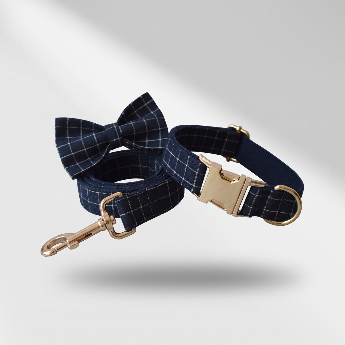 Plaid Dog Collar & Leash, studio photo on a light grey background