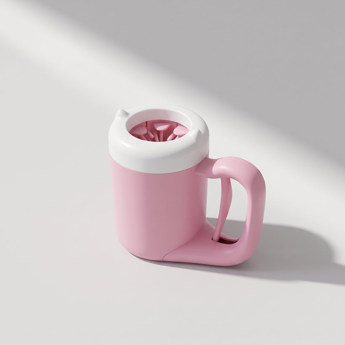 Portable Dog Paw Cleaner, studio photo on a light grey background