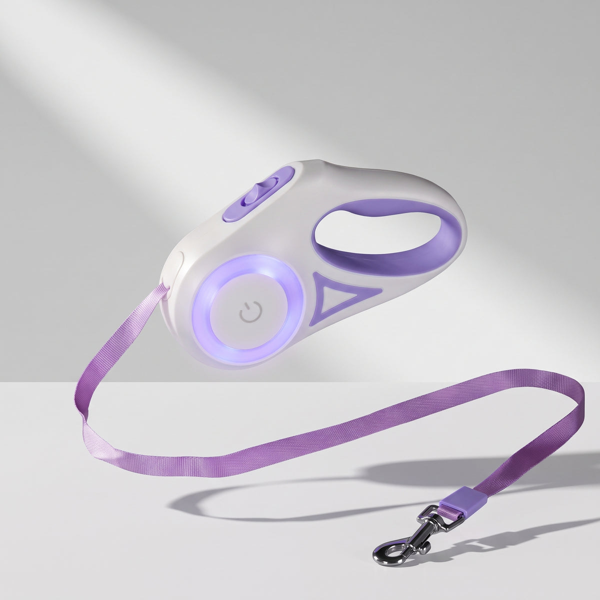 Retractable Dog Leash With Light, studio photo on a light grey background