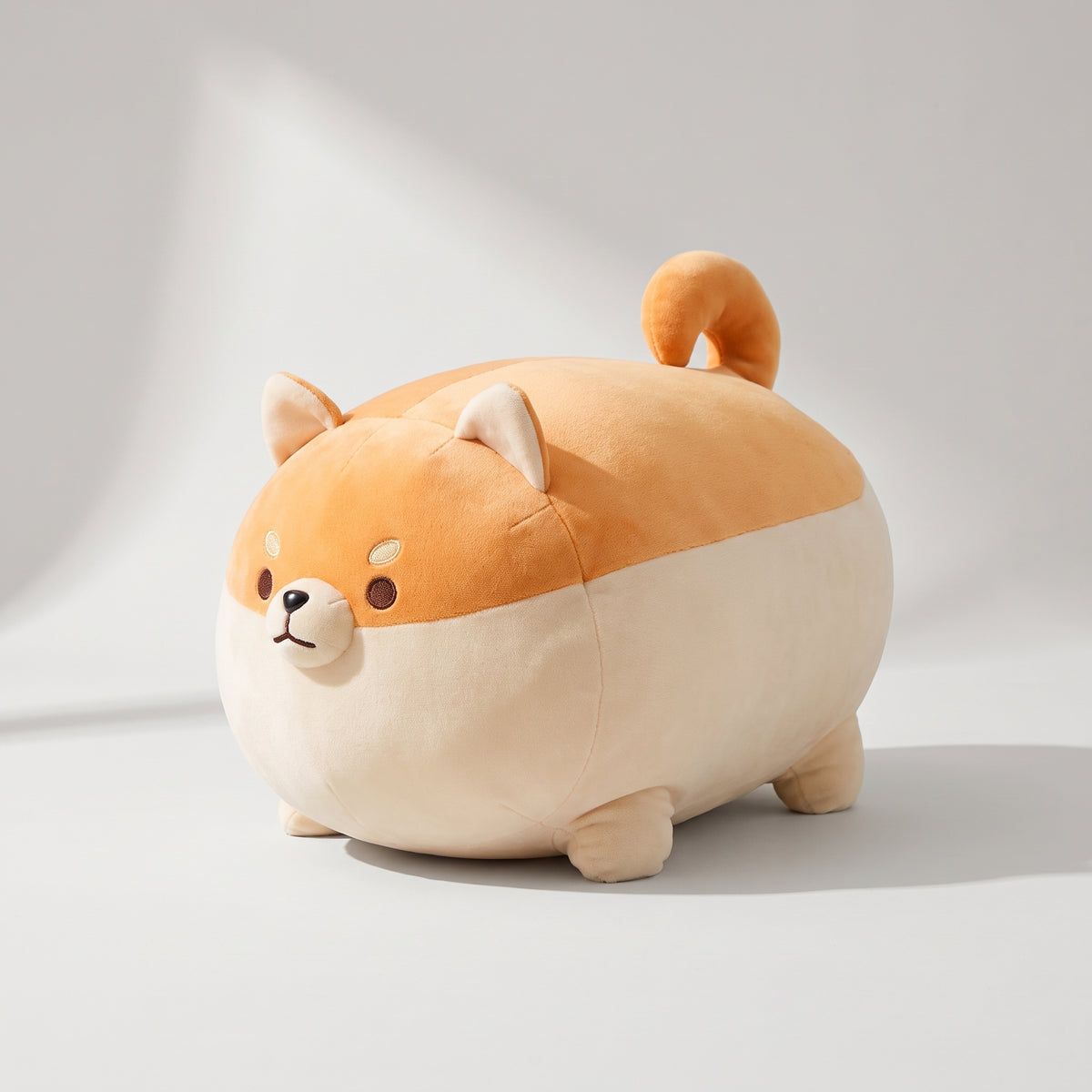 Shiba Inu Plush, studio photo on a light grey background