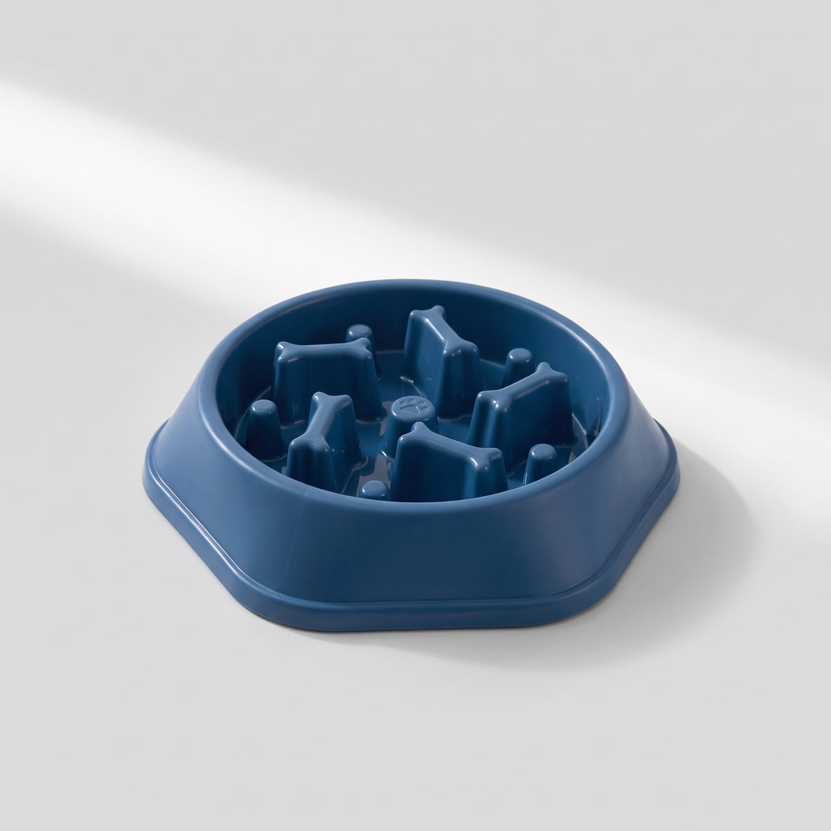 Slow Feed Dog Bowl For Small Dogs, studio photo on a light grey background