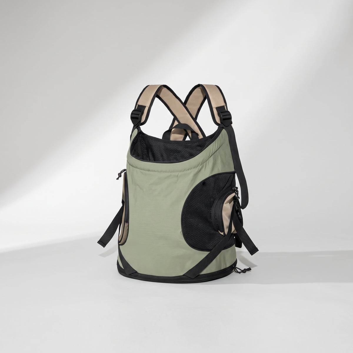 Small Dog Backpack Carrier, studio photo on a light grey background