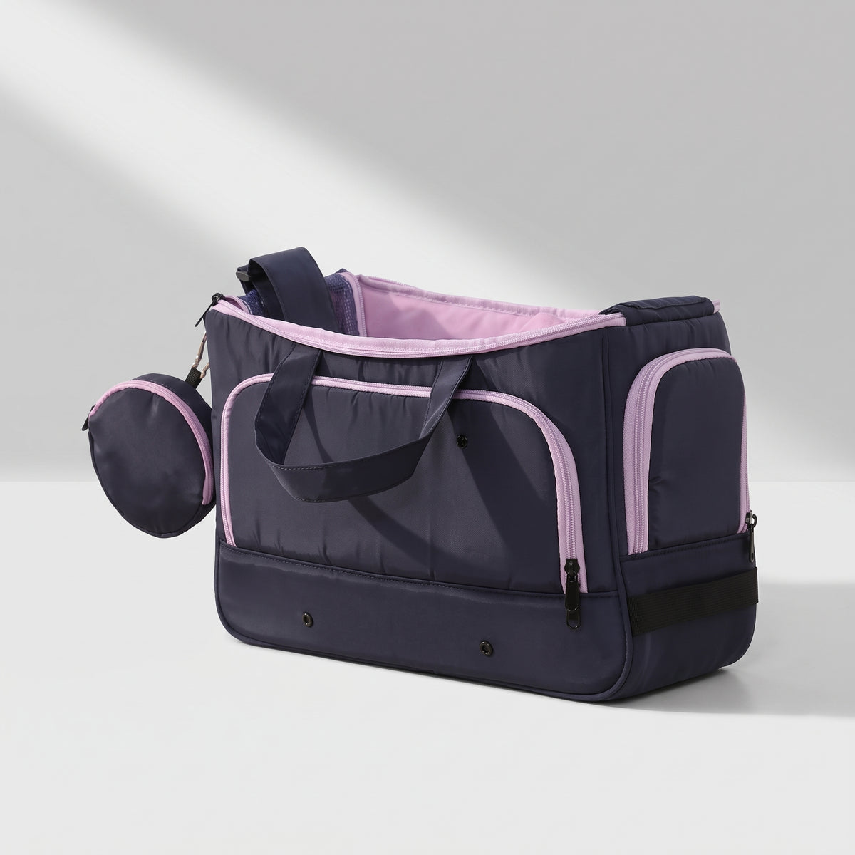 Small Dog Carry Bags, studio photo on a light grey background