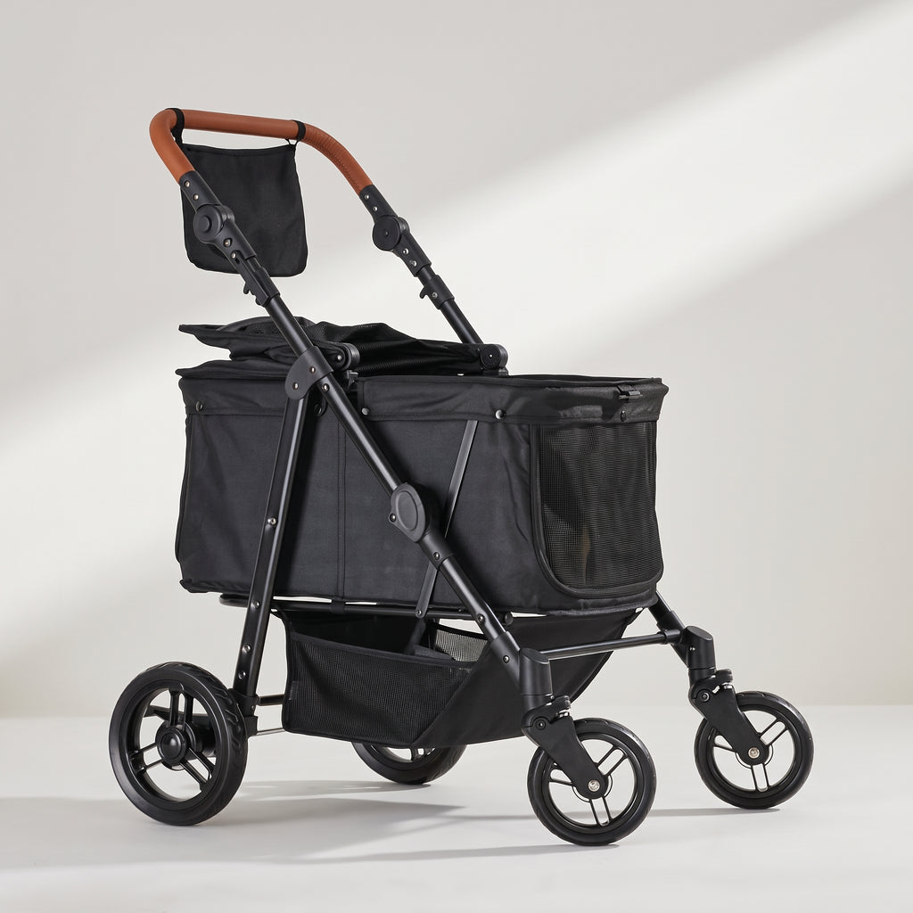 Black Folding Dog Stroller, Easy to Steer, studio photo on a light grey background
