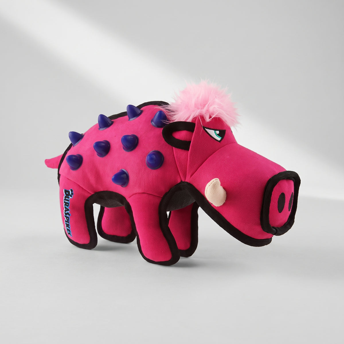 Tough Dog Toys, studio photo on a light grey background