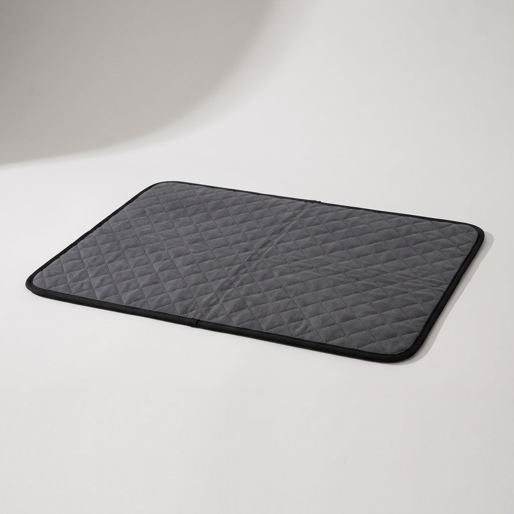 Washable Dog Pee Mat, studio photo on a light grey background